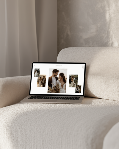 Laptop mockup styled on a modern cream boucle chair with soft draping curtains and concrete-textured walls—featuring a brand portfolio layout, evoking elegance and refined brand strategy.