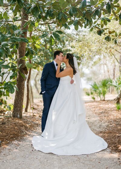 bride and groom kissing