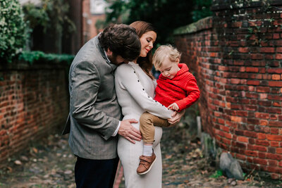 A candid joA sweet moment of a family in Old town Alexandria captured by a Northern Virginia Family photographeryful moment captured by Denise Van, a Northern Virginia Family photographer