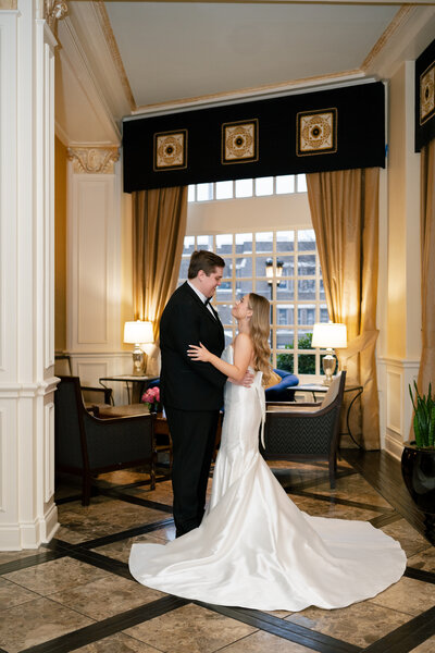 Bride and groom portraits in Dallas Hotel Downtown