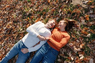 Couple-playing-leaves
