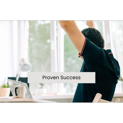 Happy man raising both arms with “Proven Success” text overlay, representing positive results.