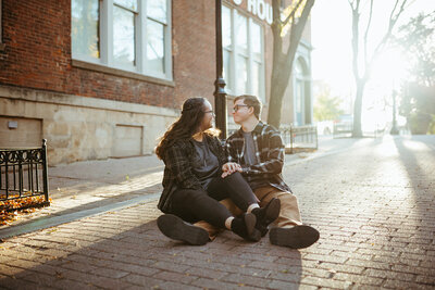 city engagement, young couple, liberty memorial, field photoshoot, kansas city engagement, kansas city couple