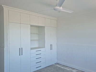 Neat and professional bedroom wall painting completed by New-Style Painting Service.