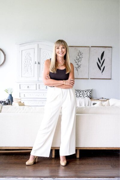 Shari exuding confidence with arms crossed. Ideal for personal branding photoshoots, professional demeanor, and assertiveness.