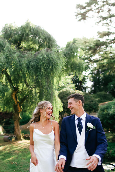 couple-laughing-at-luxury-wedding-in-london