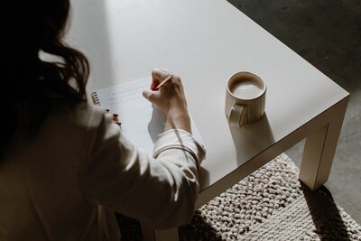 Woman typing on a laptop