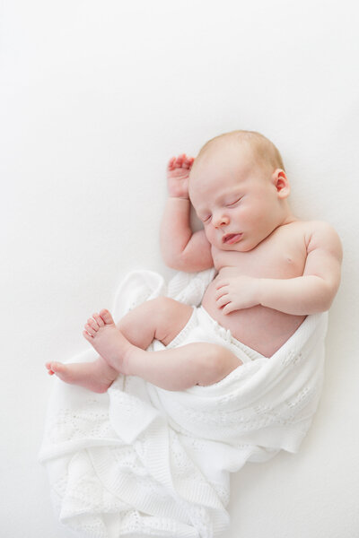 Baby sleeping at Boise newborn photograhy studio.