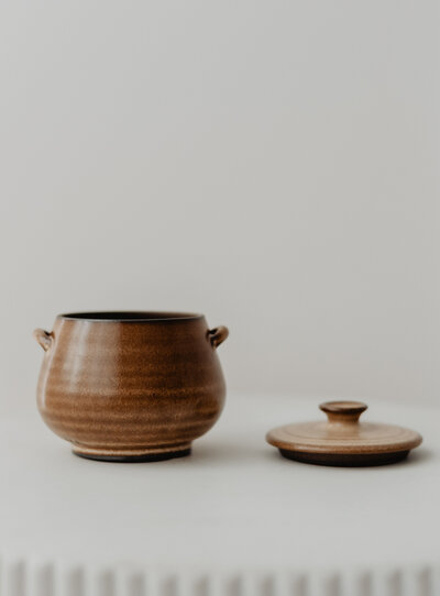 a handmade piece of pottery on a white backdrop