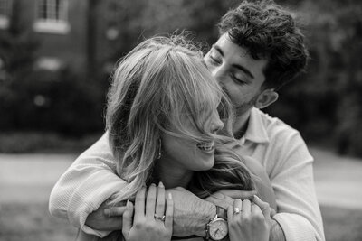 Jared had just proposed to his now fianceé and grabbed her in a warm embrace, as the wind blew her hair. This moment in their Sarasota engagement session felt like such a cinematic moment!