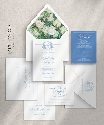 The Ashford 5-piece semi-custom wedding invitations suite — a romantic blue and white design with elegant script and coastal charm.