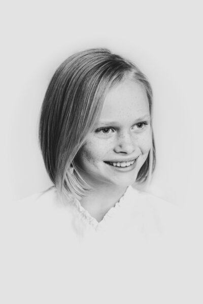 Heirloom black and white portrait of young girl taken by Valerie Worth in Raleigh, NC studio