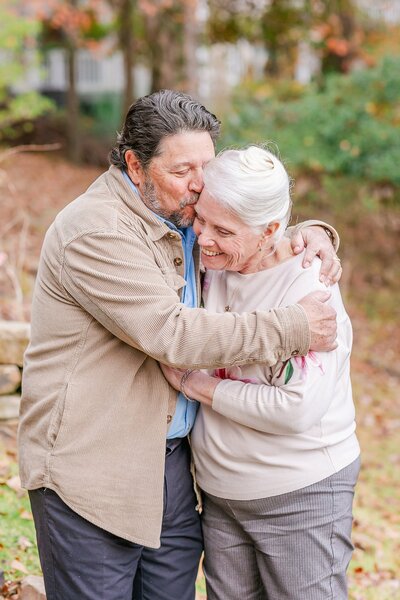 Married couple posing together at Lake Martin couples session