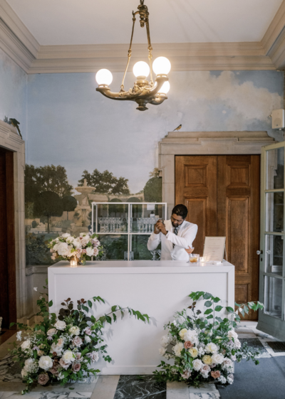 Estate bartender preparing cocktails at wedding – Rehearsal Dinner & Wedding Weekend Photography at Anderson house