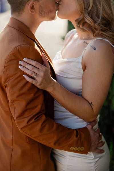 couple kissing for atlanta engagement photos