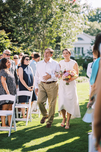 Raleigh NC wedding ceremony aisle kiss