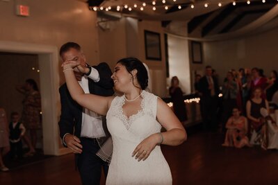 toledo ohio wedding photographer shows a photo of a bride dancing with her uncle
