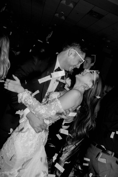Black and white of couple embracing, taken by one of the best orlando photographers
