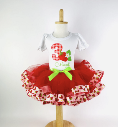 Strawberry birthday tutu with red and green bow