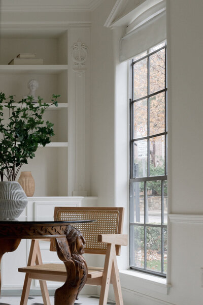 Light, neutral trauma‑informed therapy room interior representing online healing space rooted in Los Angeles