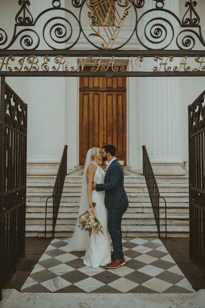 man embracing woman from behind