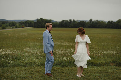 Bride twirling beside Groom at Kensington Cove Farm