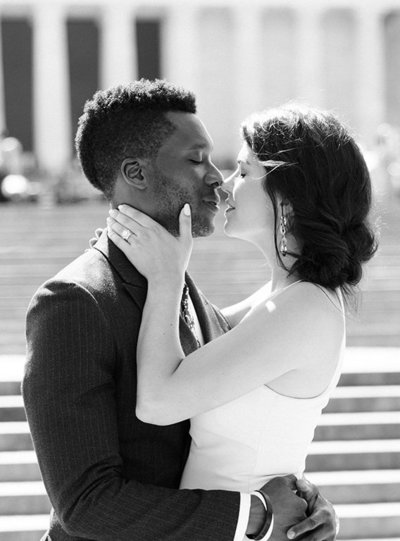 Groom giving the bride a kiss