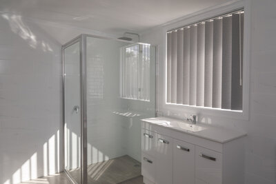Custom bathroom mirrors and shower screens, crafted for style and functionality in residential spaces.