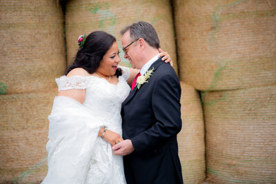 bride holding flowers in patio garden