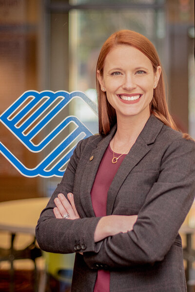 Professional headshot of Laura Stansberry, a luxury maternity and family photographer in St. Louis."