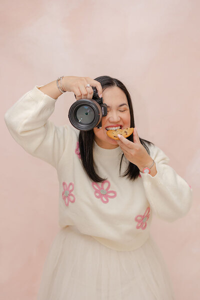 photographer eating cookie