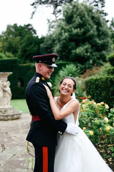 couple-laughing-at-military-wedding-in-london