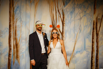 Couple-in-photobooth-with-wearing-funny-glasses