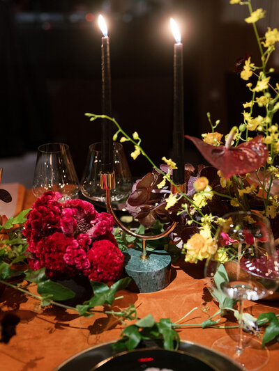 Garden inspired wild flower centerpieces on table