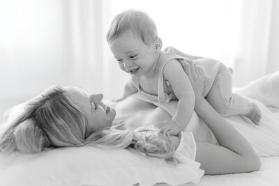 ntimate mother and baby portrait in Tampa studio with soft, luxurious tones