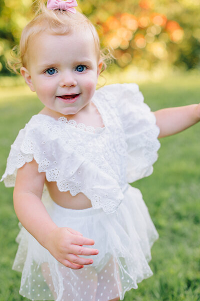 Asheville Family Photographer captures baby girl at the NC Arboretum in Western NC