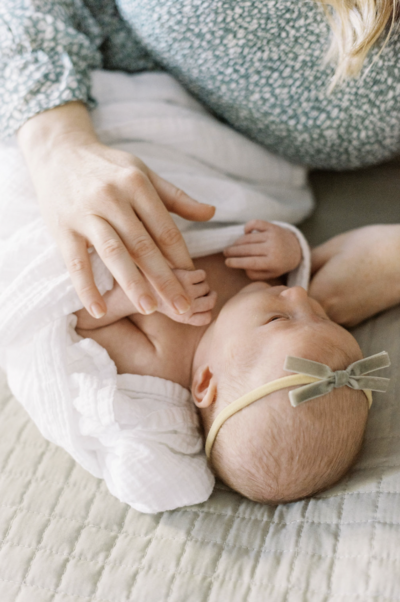 neutral newborn portrait in nursery