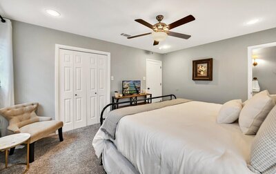 Master bedroom with private bathroom in this Entry way of this three-bedroom, two-bathroom vacation rental home featured on Chip and Joanna Gaines' Fixer Upper located in downtown Waco, TX.