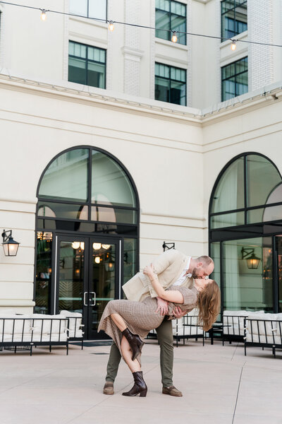 A couple kissing as the man dips his wife in Alpharetta, Ga. 