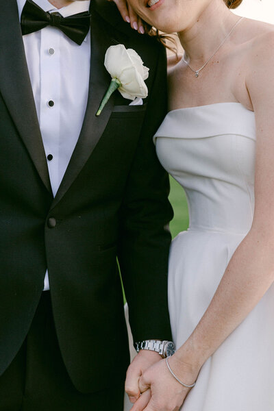Bride and groom pose together during their portraits at the Arizona Biltmore in Scottsdale.