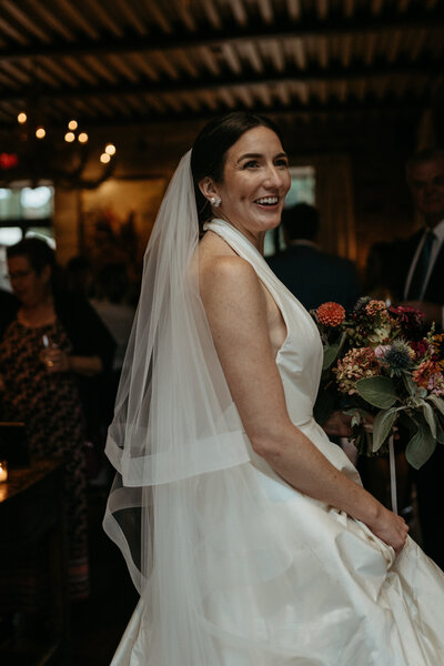Bride walking into wedding venue at the Apiary in Lexington Kentucky