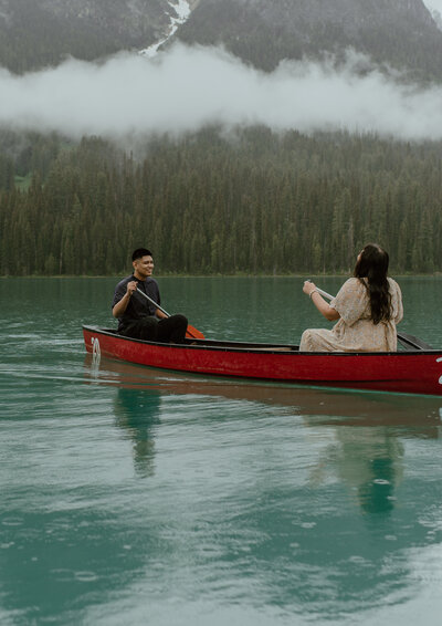 adventurous canoeing couple for engagement session in Alberta, Canada