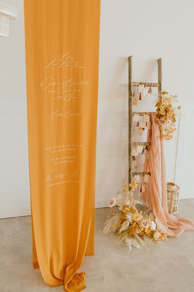 Boho chic wedding inspiration with Fall colour palette at Tin Roof Event Centre, a modern wedding venue in Lacombe, Alberta, featured on the Brontë Bride Blog.