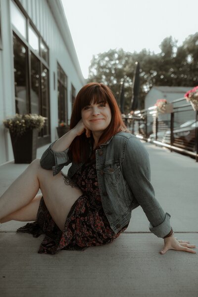 woman standing with her hands on her hips