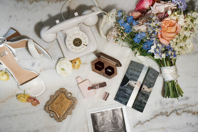 rotary telephone lipstick flowers wedding rings details
