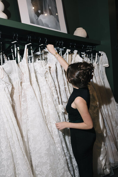bride wearing lace form fitting wedding dress