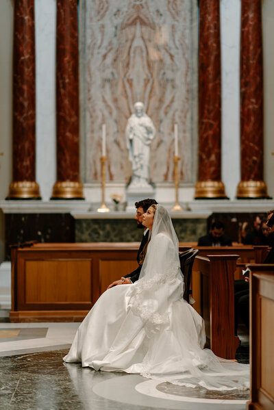 bride gazing at the crucifixion