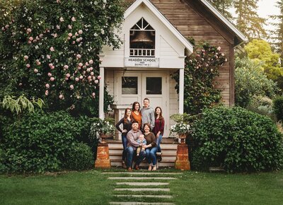 Family gathers for portrait outdoors