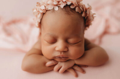Baby posed for Newborn Photoshoot in Charleston.