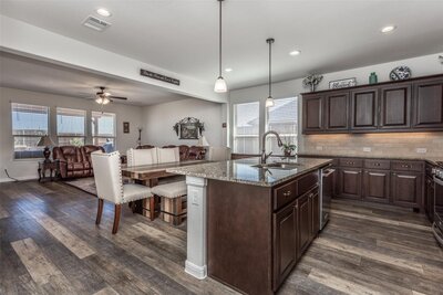 Open floorplan kitchen in home for sale in Krum Texas